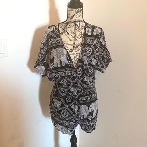 Girl Revolution Black and white elephant romper